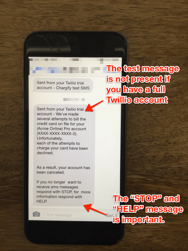 Phone showing a received dunning SMS, annotated to note that the trial-account prefix is absent on a full account